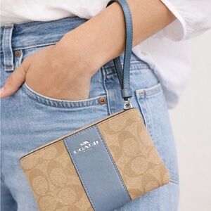 Corner Zip Wristlet
In Signature Canvas With Stripe